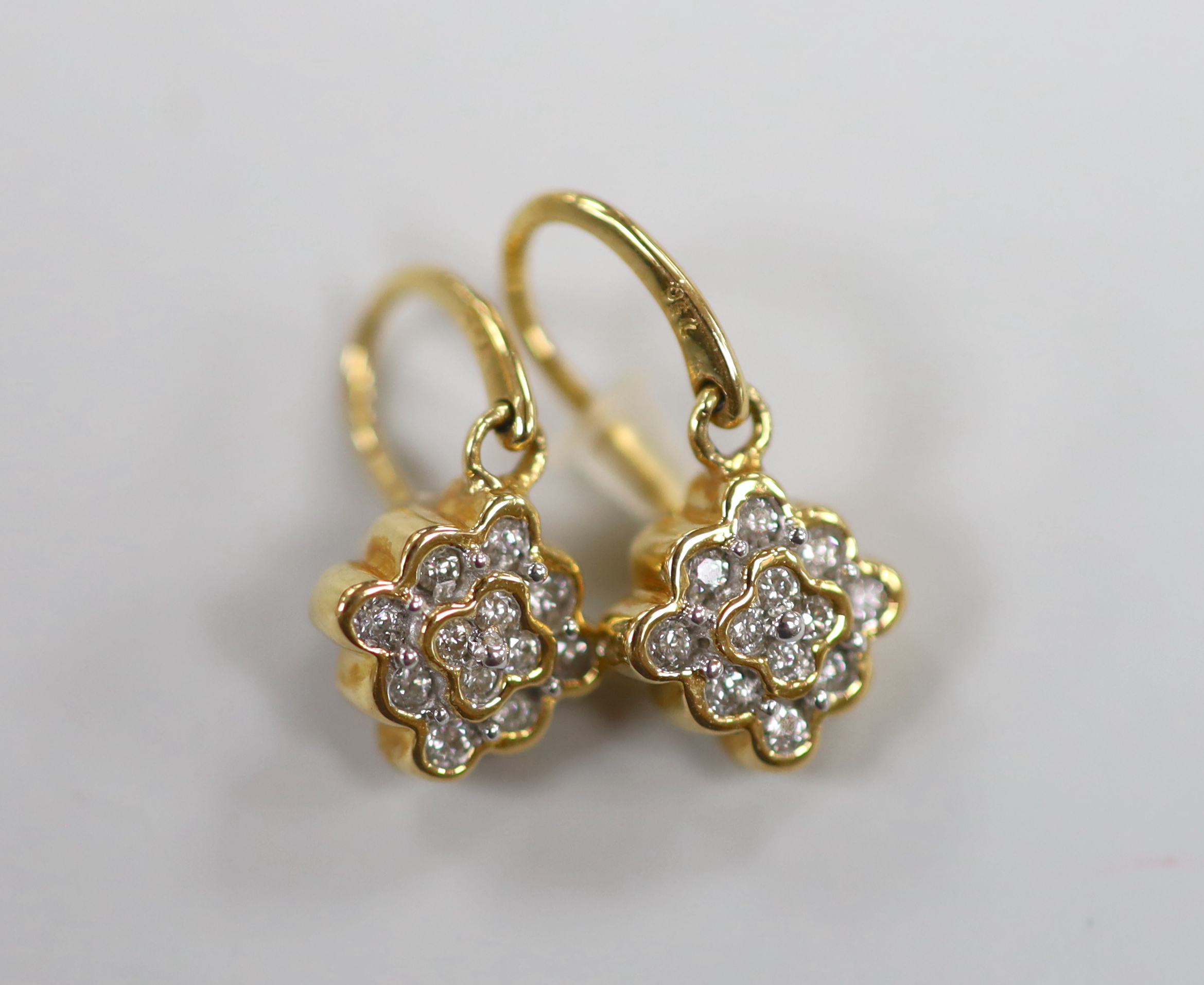 Two modern pairs of 18ct gold and diamond chip cluster earrings, including half hoop, 15mm, gross weight 6.9 grams.